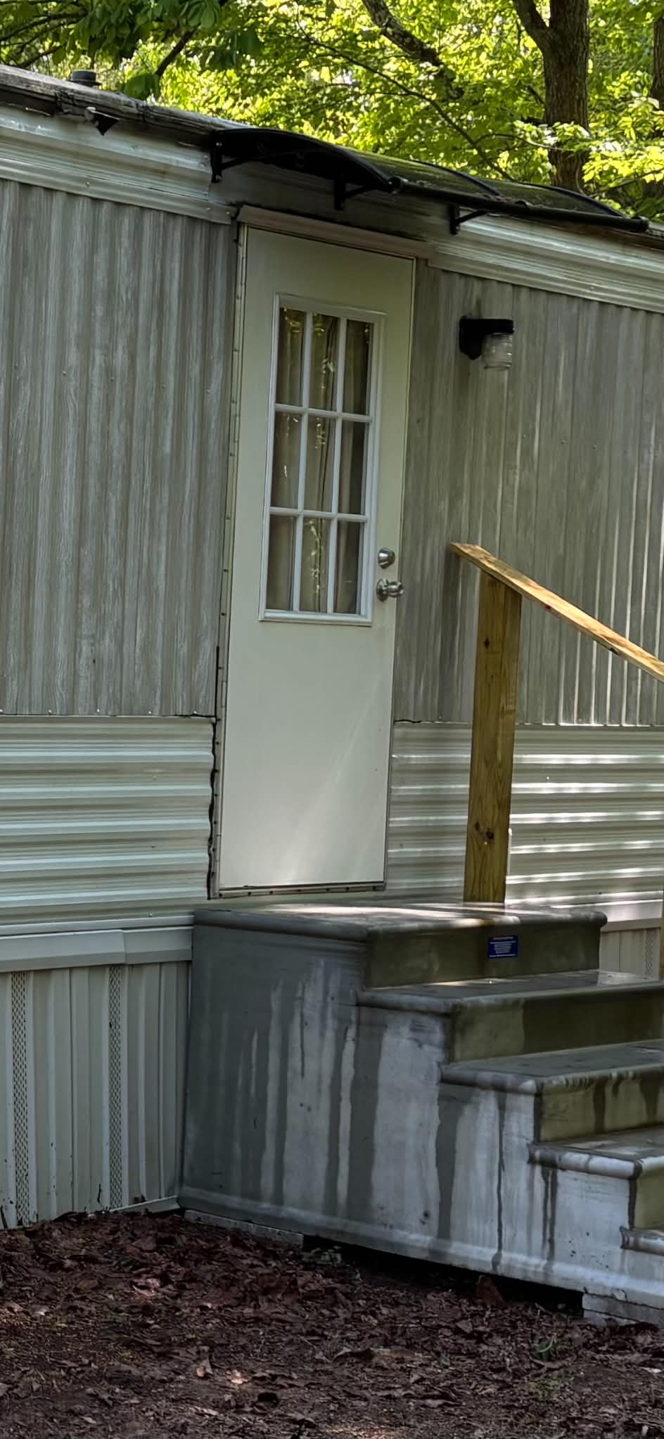 After pressure washing with cleaner siding, door, rail, and steps